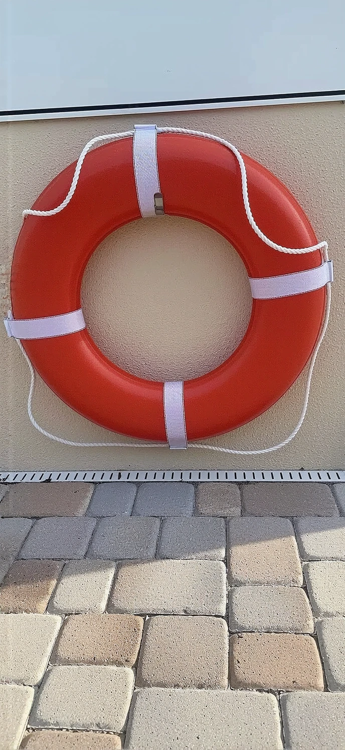 Customer photo of dock safety kit contents displayed on wooden deck