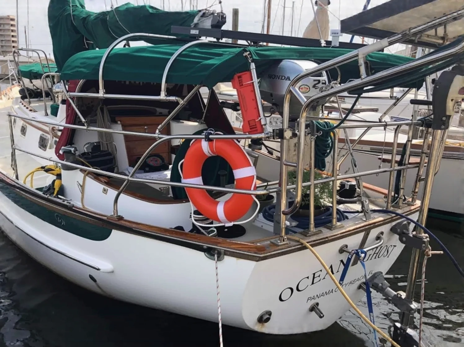Customer photo of safety kit contents displayed on a dock surface showing rescue and emergency equipment