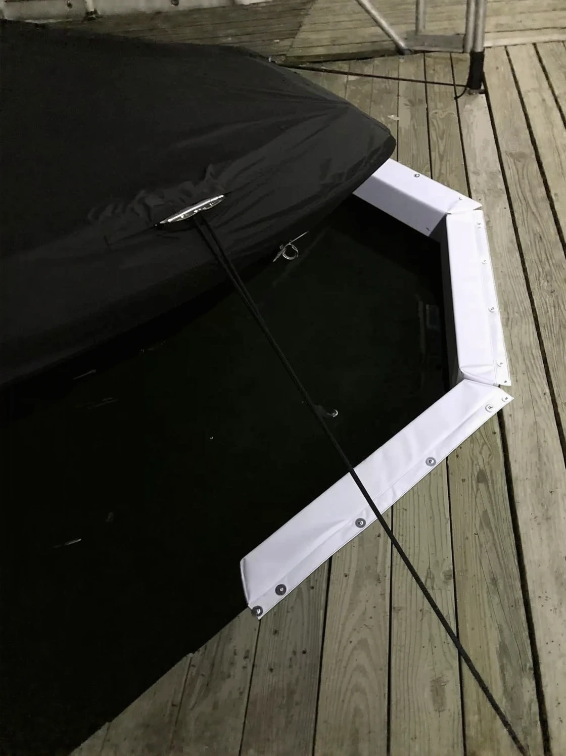 Customer photo of dock bumper and cleat installation showing weathered hardware after hurricane season