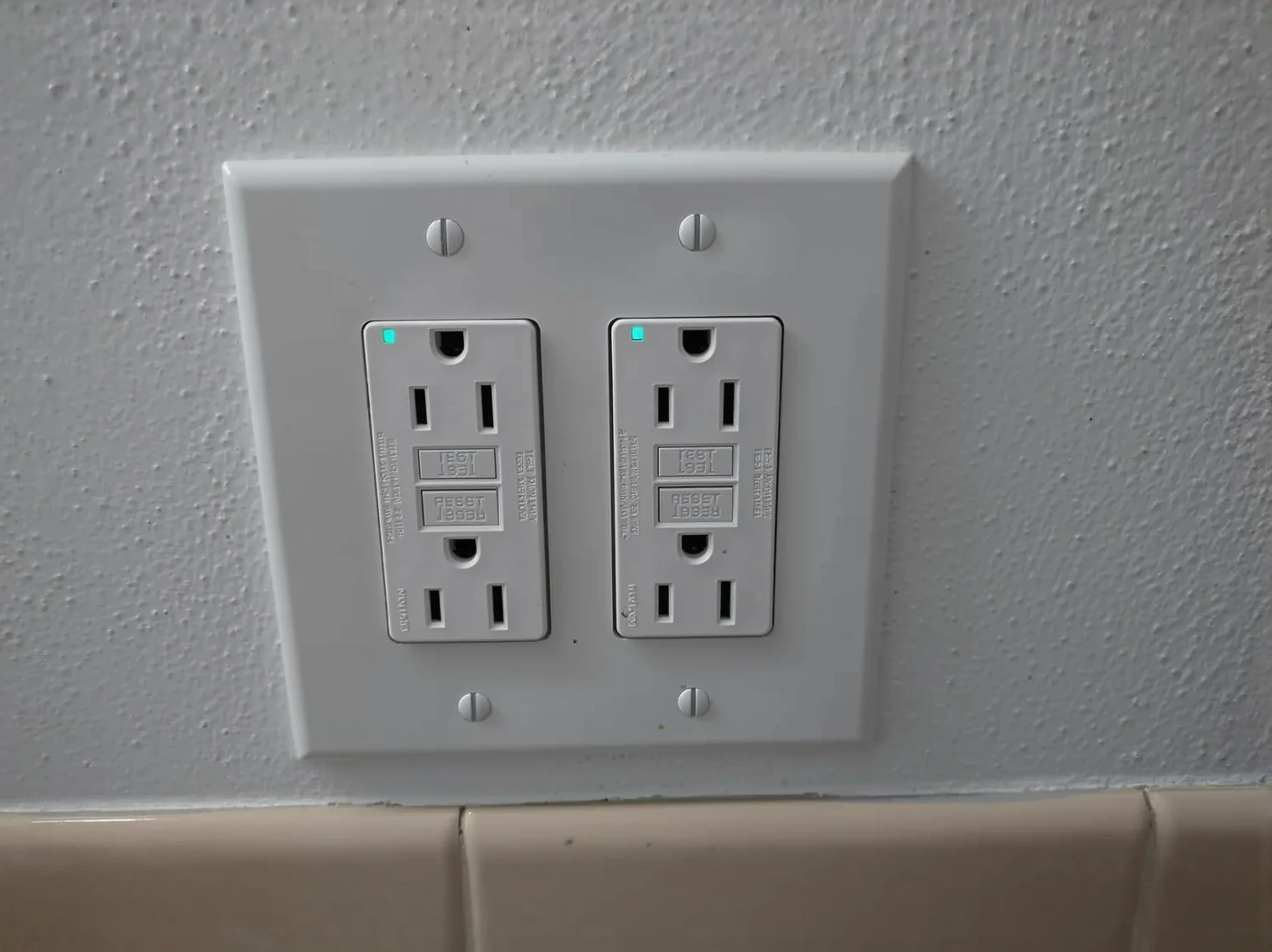 Customer photo of GFCI outlet installed on exterior dock electrical box
