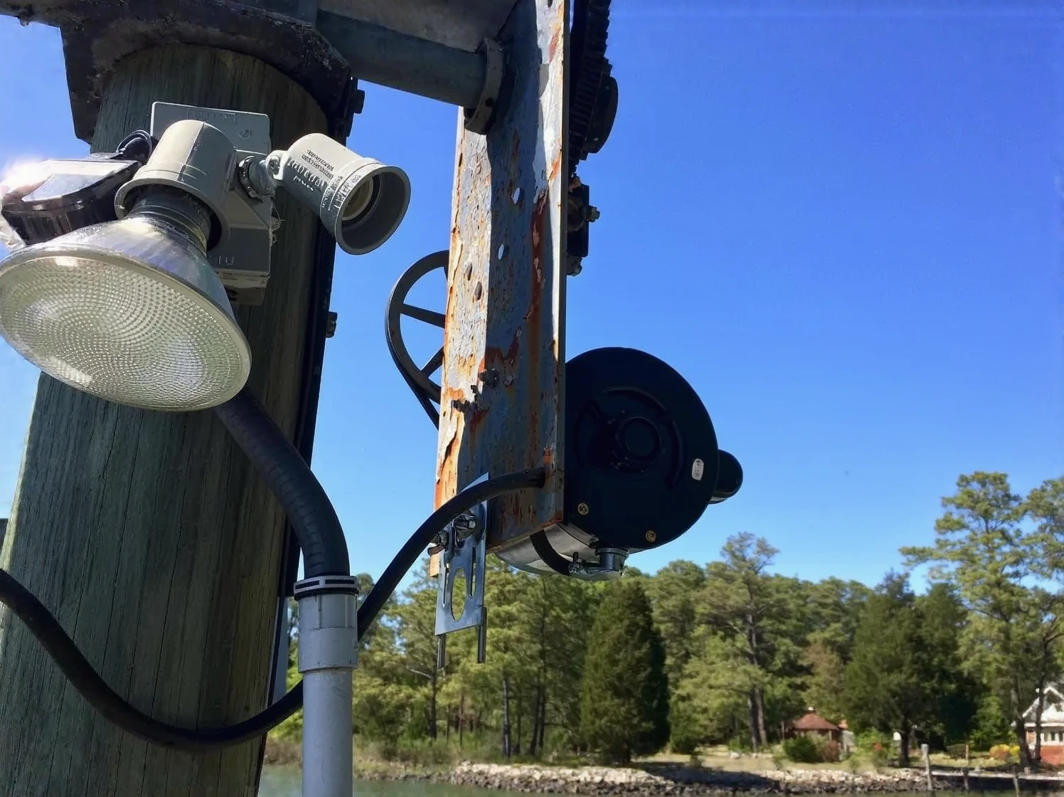 Customer photo of vertical boat lift installation showing weight capacity and mounting hardware
